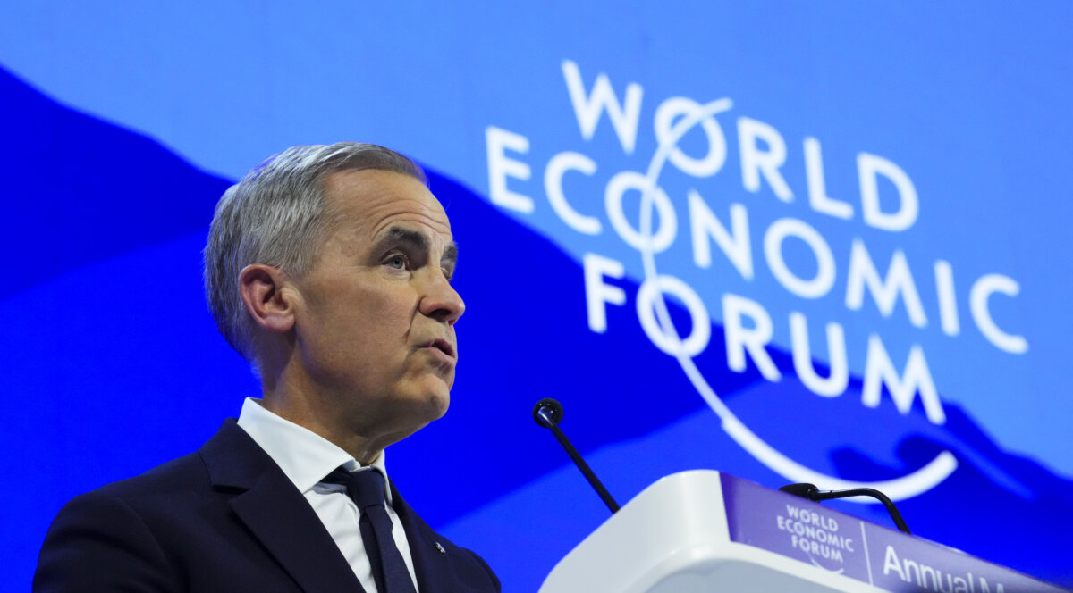 Prime Minister Mark Carney delivers a speech at the World Economic Forum in Davos, Switzerland on Jan. 20, 2026. (The Canadian Press/Sean Kilpatrick)