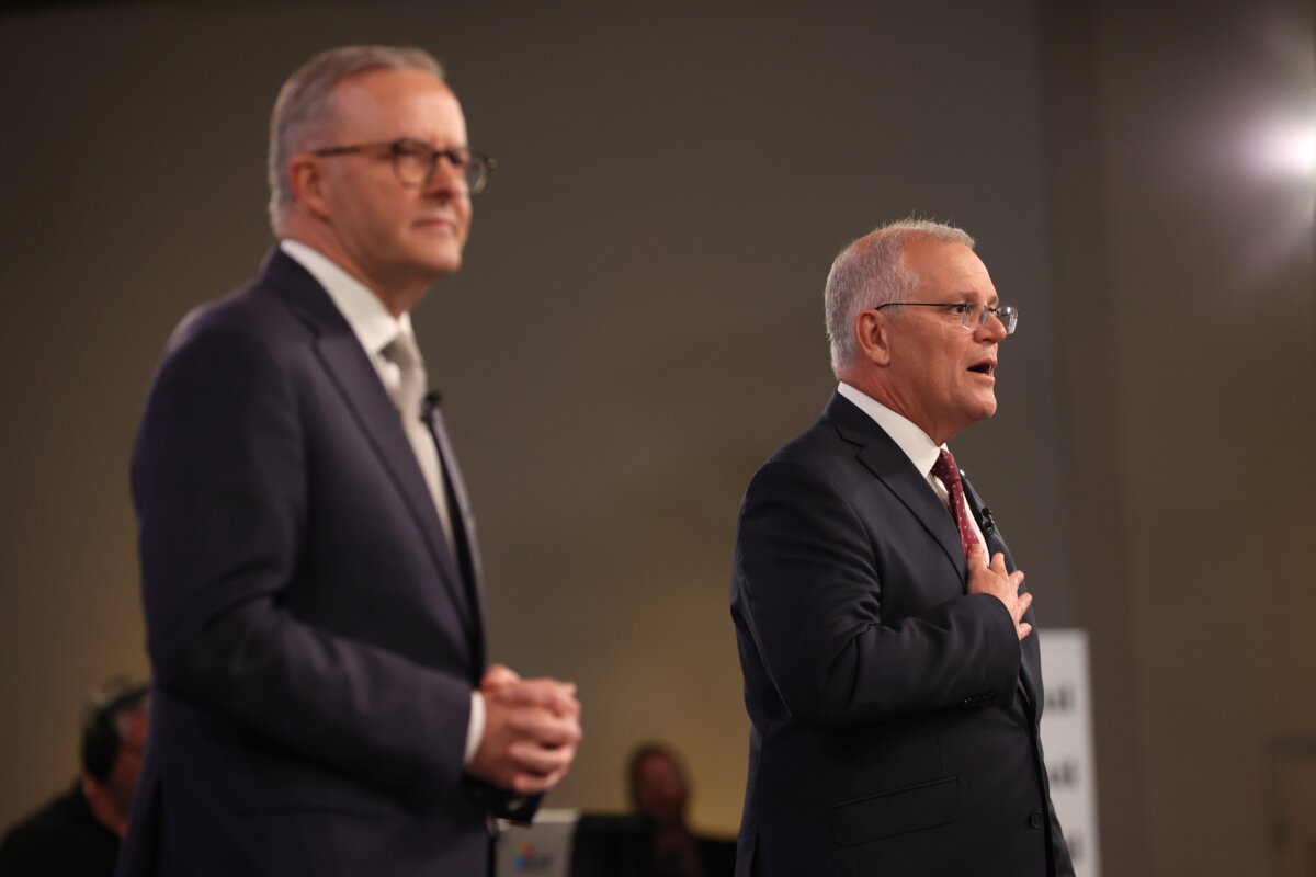 Prime Minister Anthony Albanese (L) and former Prime Minister Scott Morrison attend the first leaders' debate of the 2022 federal election campaign in Brisbane, Australia, on April 20, 2022. (Jason Edwards-Pool/Getty Images)