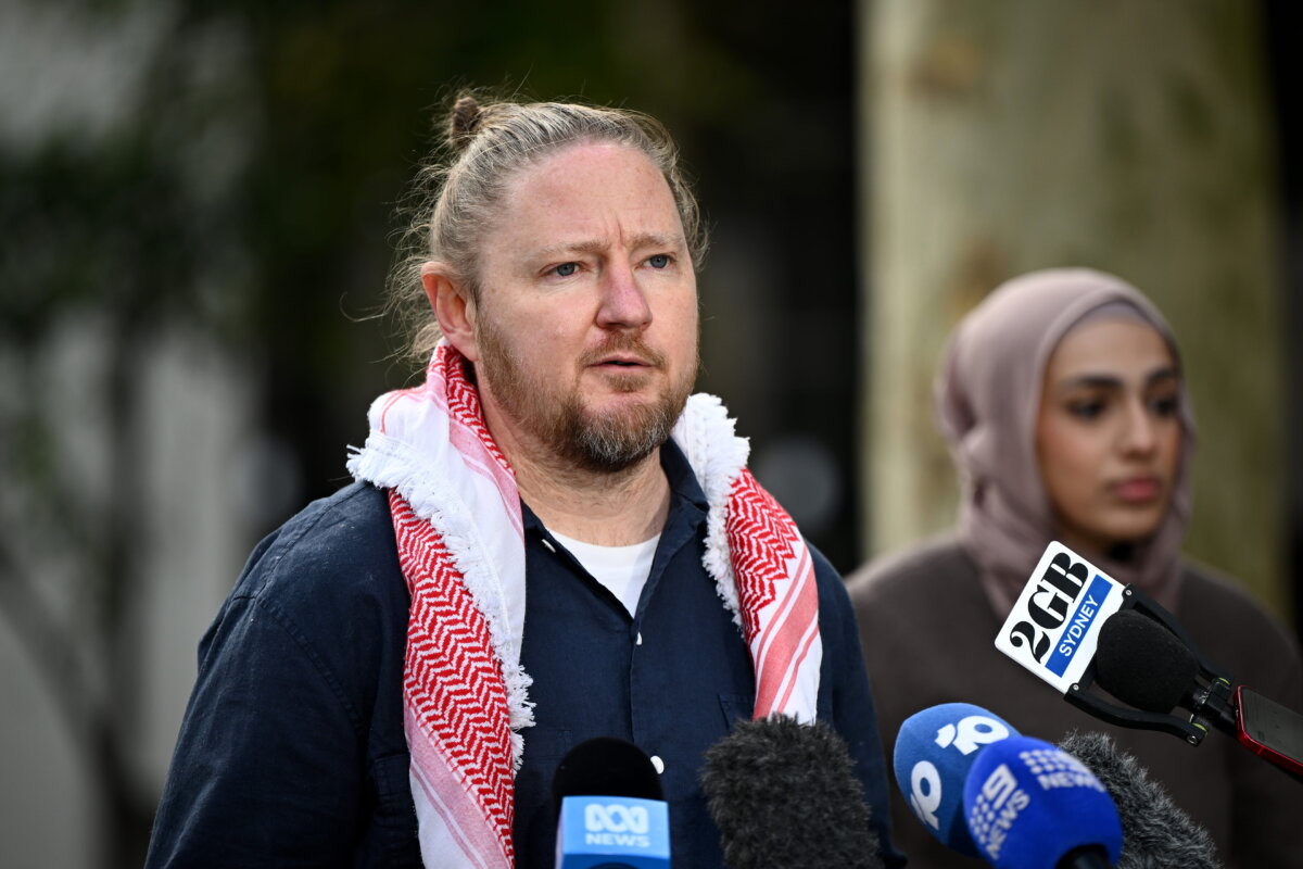 Prominent Palestine Action Group organiser Josh Lees, and a member of the Socialist Alternative, speaks to media during a press conference in Sydney, Australia on July 29, 2025. (AAP Image/Bianca De Marchi)