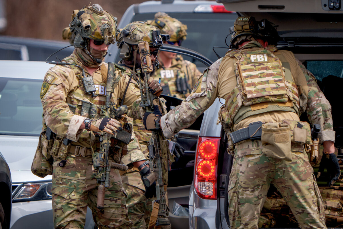 Members of FBI SWAT arrive as law enforcement responds to reports of an armed individual near CIA headquarters in McLean, Va., on March 19, 2025. (Andrew Harnik/Getty Images)