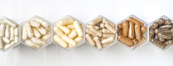 A clean display of different supplements designed for everyday wellness.