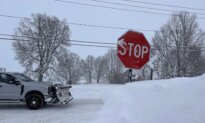 Winter Storm Snarls Travel, Threatens Power Outages as Ice and Snow Sweep US