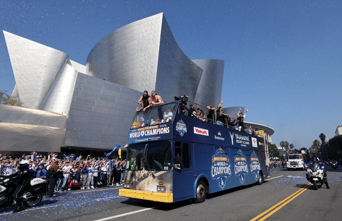 The Los Angeles Dodgers celebrate on a bus during the Dodgers 2025 World Series Championship parade in Los Angeles, Calif., on Nov. 3, 2025. (Kevork Djansezian/Getty Images)