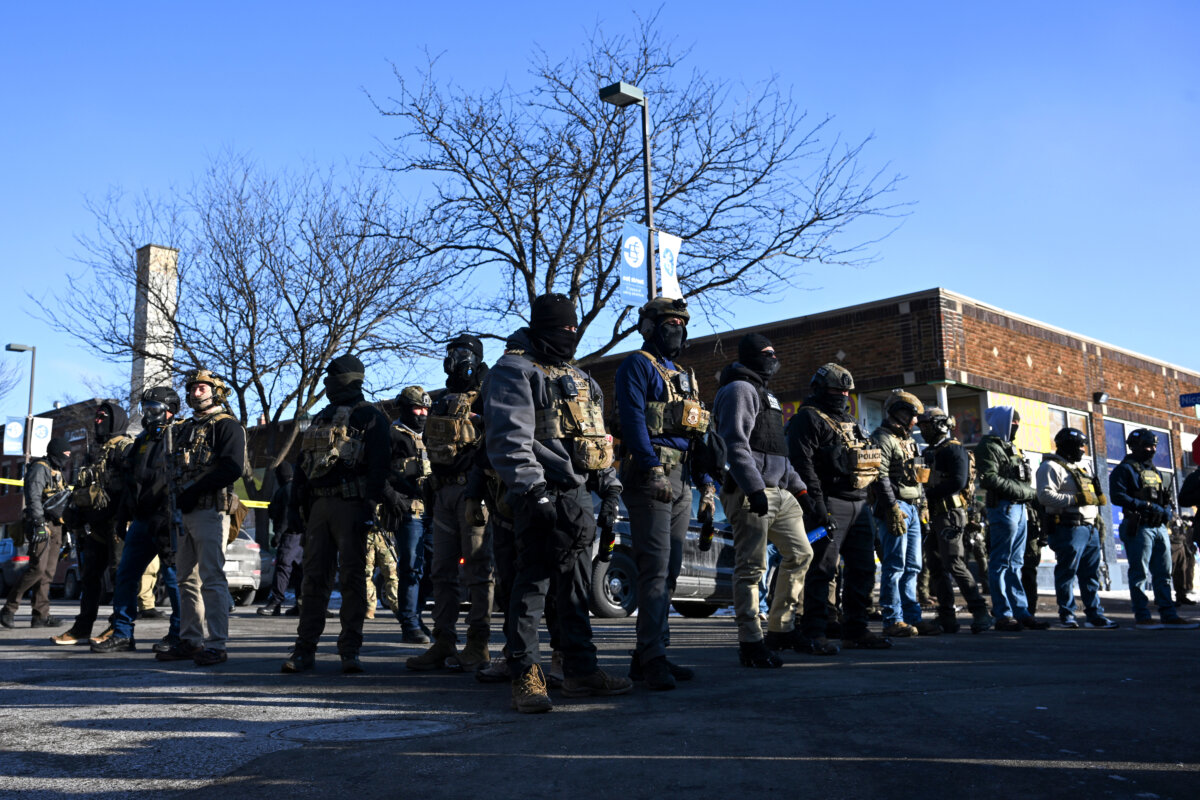 Federal agents block off the scene of a shooting in Minneapolis on Jan. 24, 2026. (Brandon Bell/Getty Images)