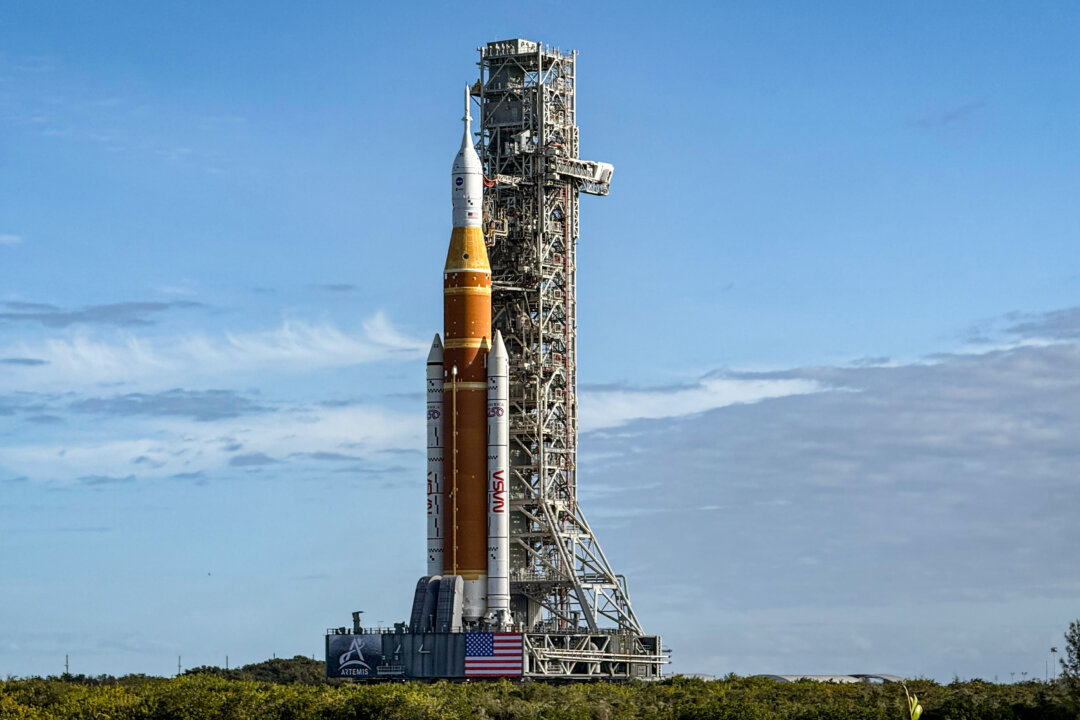 NASA Moon Rocket Rolls Back for More Repairs