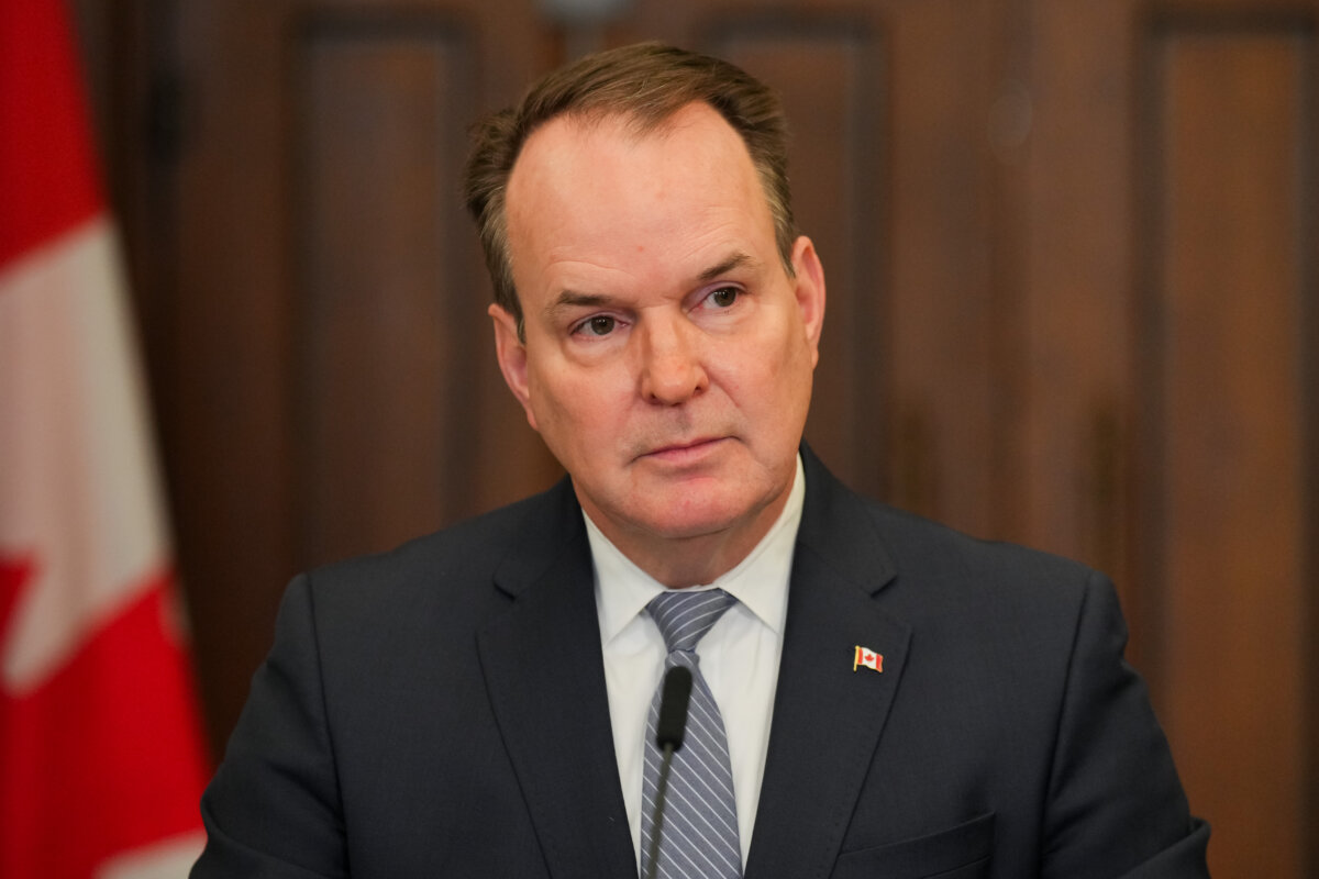 Steven MacKinnon, minister of transport and leader of the government in the House of Commons speaks in the foyer of the House of Commons on Parliament Hill in Ottawa on Jan. 26, 2025. (The Canadian Press/Chris Tanouye)
