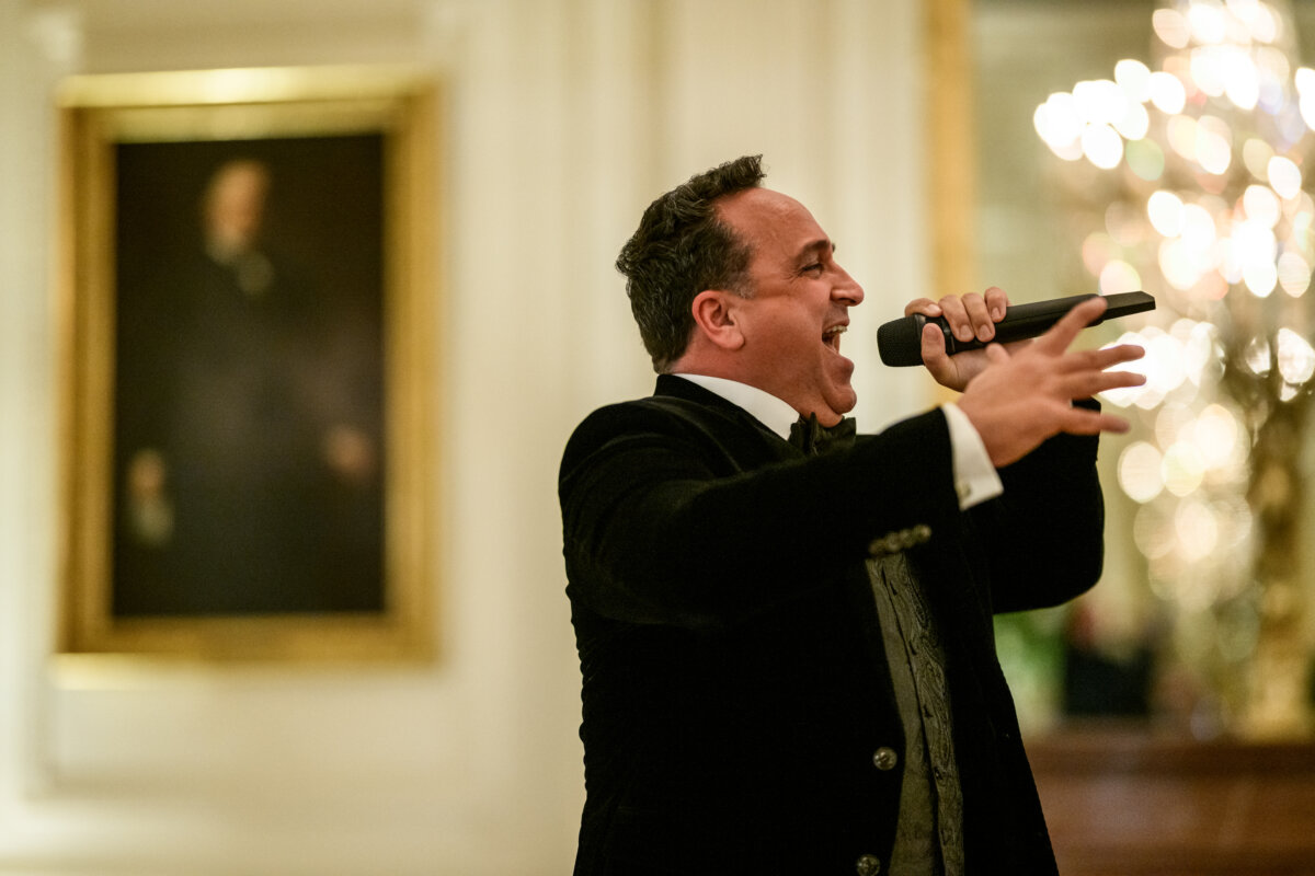 Tenor Christopher Macchio and the President’s Own Marine Band Orchestra perform at a dinner for Crown Prince and Prime Minister Mohammed bin Salman Al Saud of Saudi Arabia on Nov. 18, 2025, in the East Room of the White House. (Public Domain)