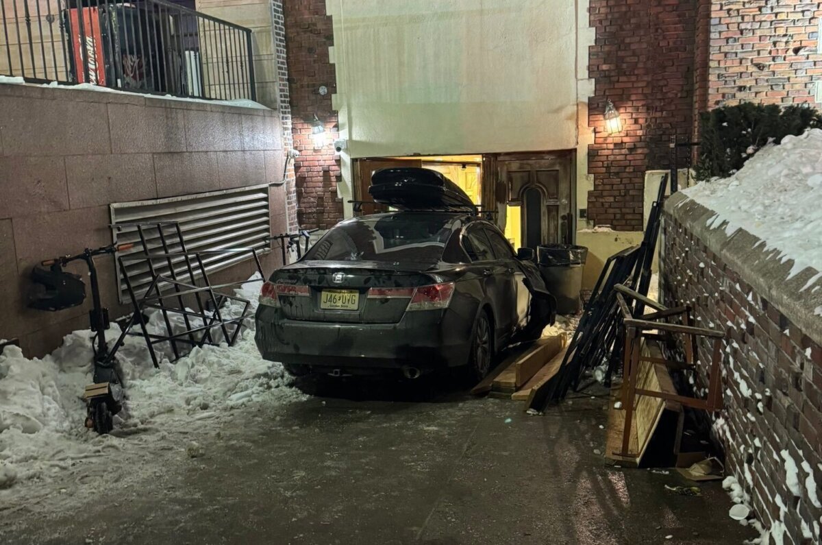 A car that crashed into the Chabad Lubavitch world headquarters in New York City, late on Jan.28, 2026. (@ChabadLubavitch/UGC via AP)