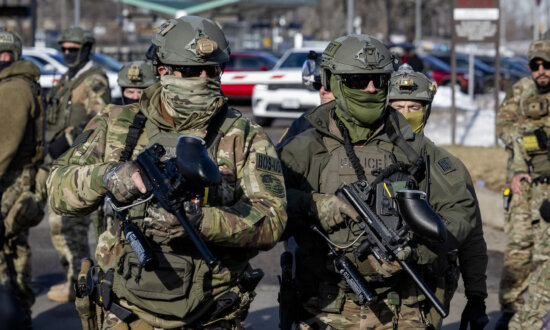 DOJ Sues Connecticut Over State’s Mask Ban on Federal Officers