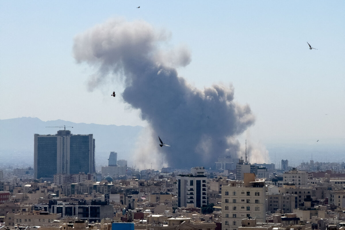 Plumes of smoke rise following reported explosions, after Iran's supreme leader, Ayatollah Ali Khamenei, was killed a day earlier in a large U.S. and Israeli attack, in Tehran on March 1, 2026. (Mahsa / Middle East Images / AFP via Getty Images)
