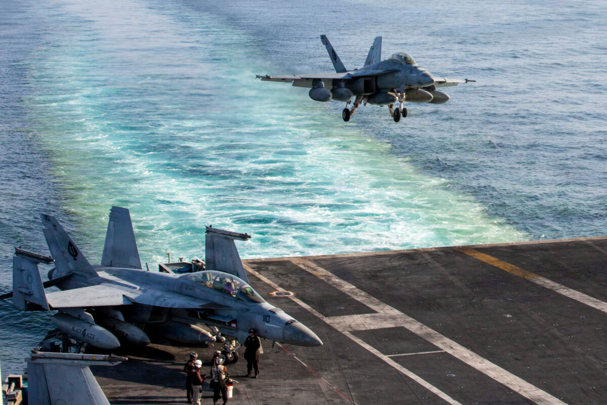 An F/A-18E Super Hornet prepares to land on the USS Abraham Lincoln after a mission in support of Operation Epic Fury, on Feb. 28, 2026. (U.S. Navy via AP)