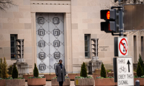 DOJ Charges 2 Chinese Nationals Who Allegedly Ran Overseas Scam Centers Targeting Americans