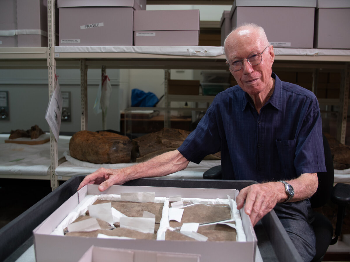 Professor Bruce Runnegar with the fossil. (Courtesy of the University of Queensland)