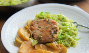 1-Pot Recipe Brings Together Pork Chops, Apples, and Warm Cabbage Slaw