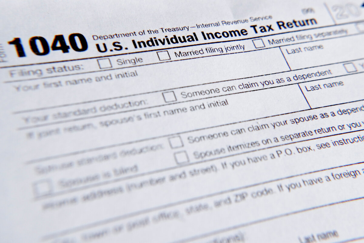 A 1040 tax form printed from the Internal Revenue Service web page is seen, Feb. 13, 2019, in Zelienople, Pa. (Keith Srakocic/AP Photo)