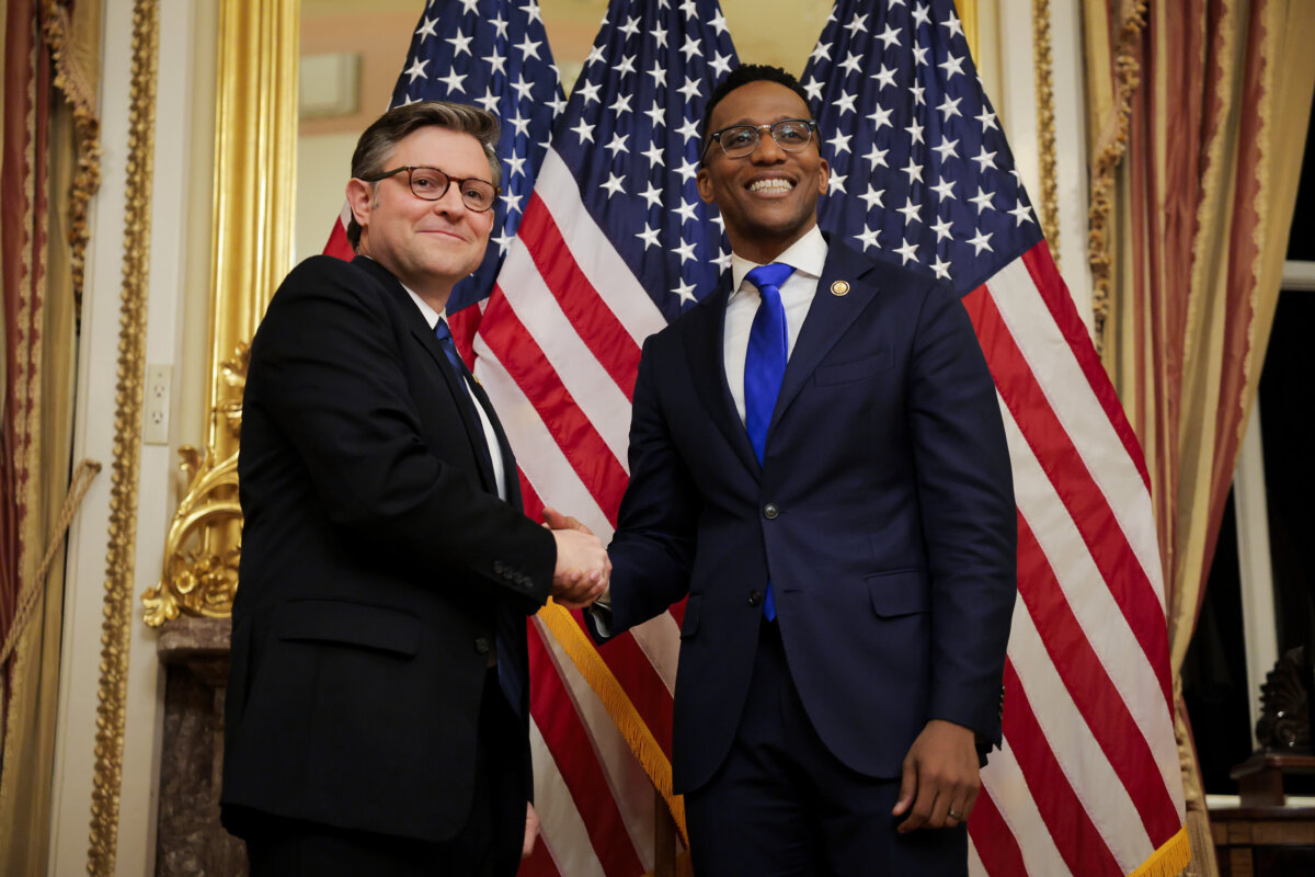 Speaker of the House Mike Johnson (R-La.) (L) swears in Rep. Christian Menefee (D-Texas) at the U.S. Capitol in Washington, on Feb. 2, 2026. (Heather Diehl/Getty Images)