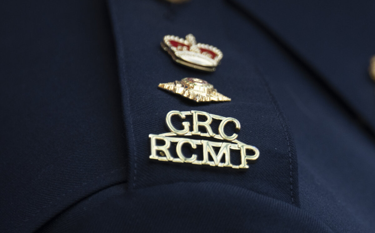 An RCMP logo is seen on the shoulder of a superintendent during a news conference in St. John's, N.L., on June 24, 2023. (The Canadian Press/Adrian Wyld)