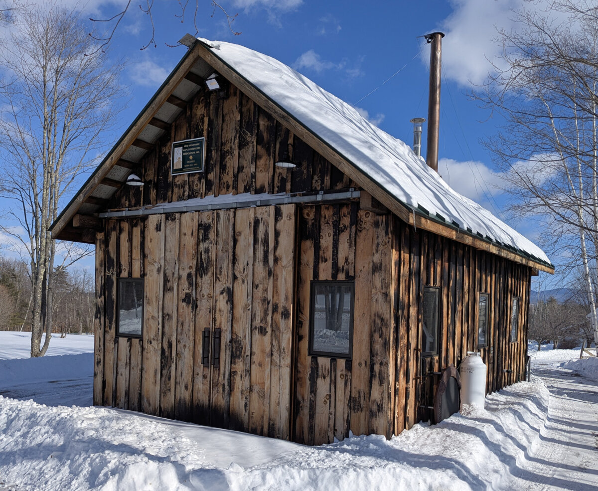 The black blotches visible on this building are not mold and mildew. The owner used a large propane-fueled blowtorch to char the siding. Charred wood resists insects, rot, and ultraviolet light damage. (Tim Carter/Tribune Content Agency)