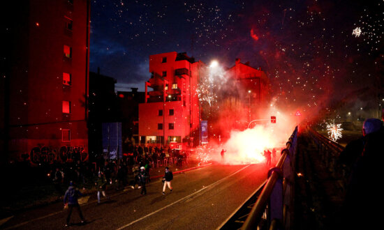 Day in Photos: Protests in Milan, Flooding in Spain, and Miniature Railway