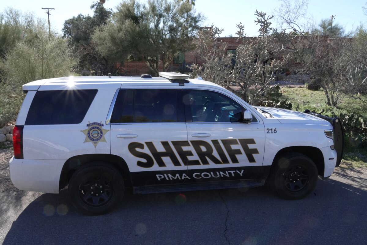 A Pima county sheriff's vehicle is parked out front of Nancy Guthrie’s home in Tucson, Ariz., on Feb. 8, 2026. (Ty O'Neil/AP Photo)