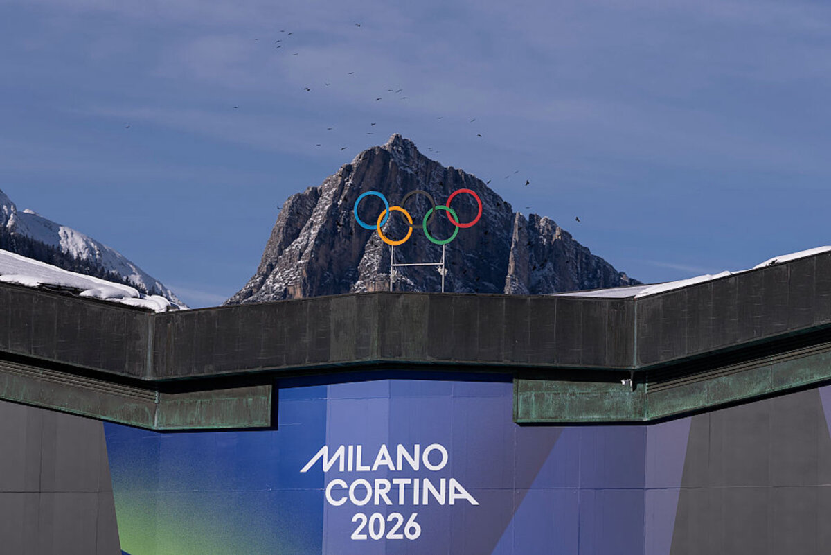 CORTINA D'AMPEZZO, ITALY—JANUARY 26: The Olympic Rings are set in front of surrounding mountains at Cortina Curling Olympic Stadium on January 26, 2026 in Cortina d'Ampezzo, Italy. Cortina will host Sliding, Curling and Women's Alpine events. (Photo by Maja Hitij/Getty Images)