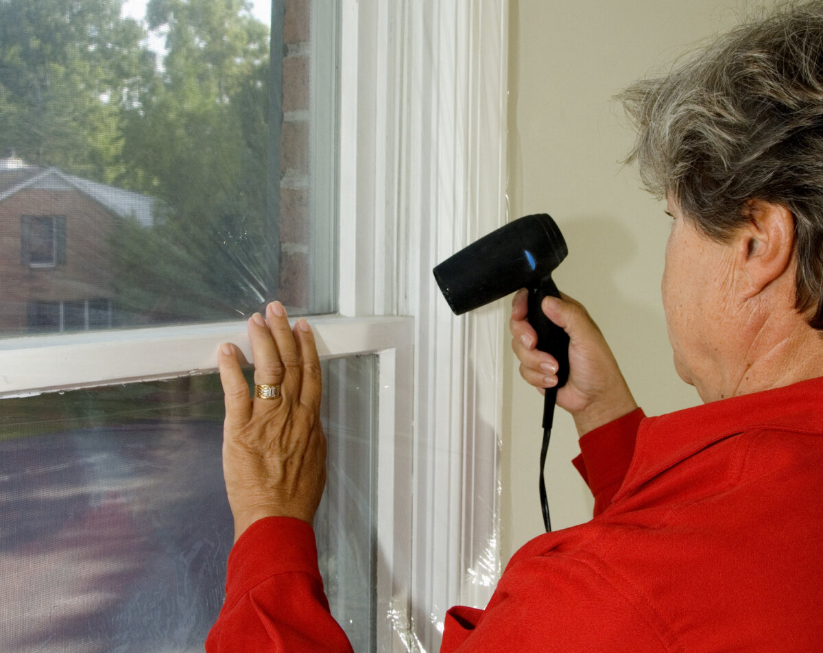 Installing window insulation film is an ideal job for a first-time do-it-yourselfer. (Gene Hamilton/TCA)