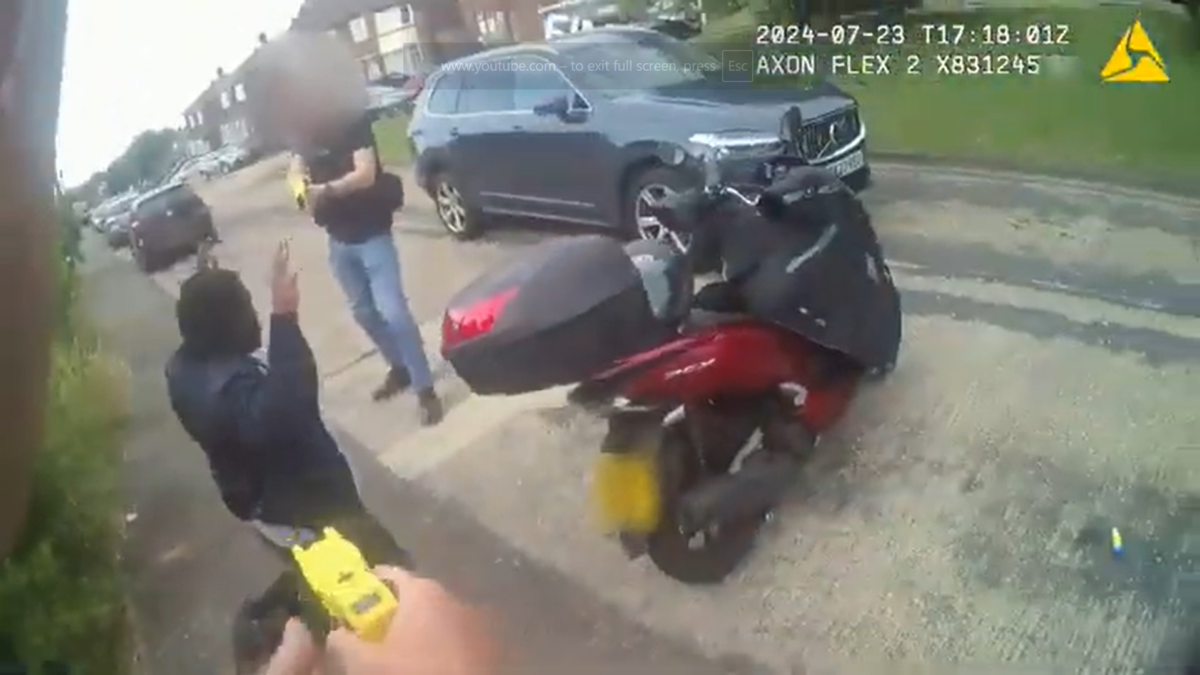 The court was shown footage of the man on his knees on the pavement (PA)