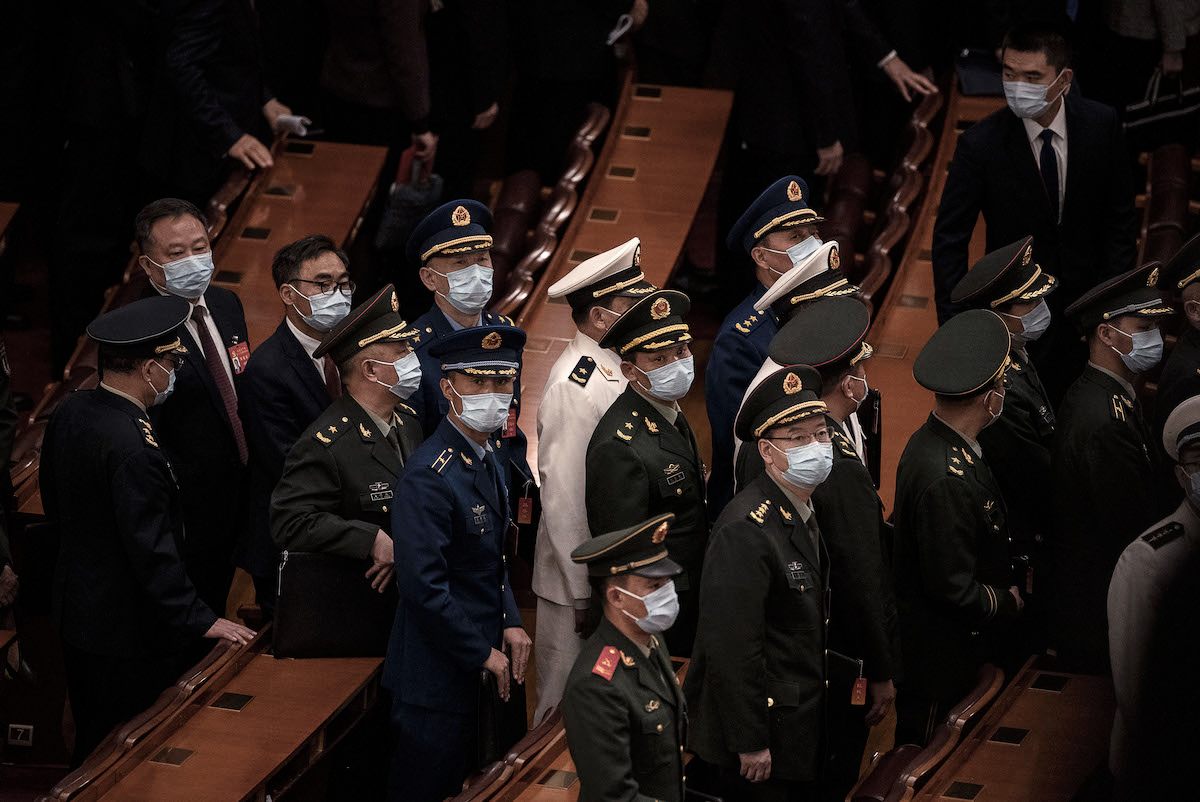 Chinese military delegates leave the closing session of the 20th National Congress of the Chinese Communist Party, at the Great Hall of the People in Beijing on Oct. 22, 2022. (Kevin Frayer/Getty Images)