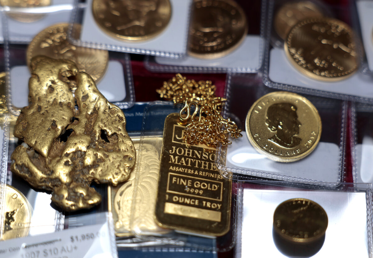A one-ounce gold bar, a gold nugget, and gold coins are displayed at Witter Coins in San Francisco on Oct. 7, 2025. (Photo Illustration by Justin Sullivan/Getty Images)