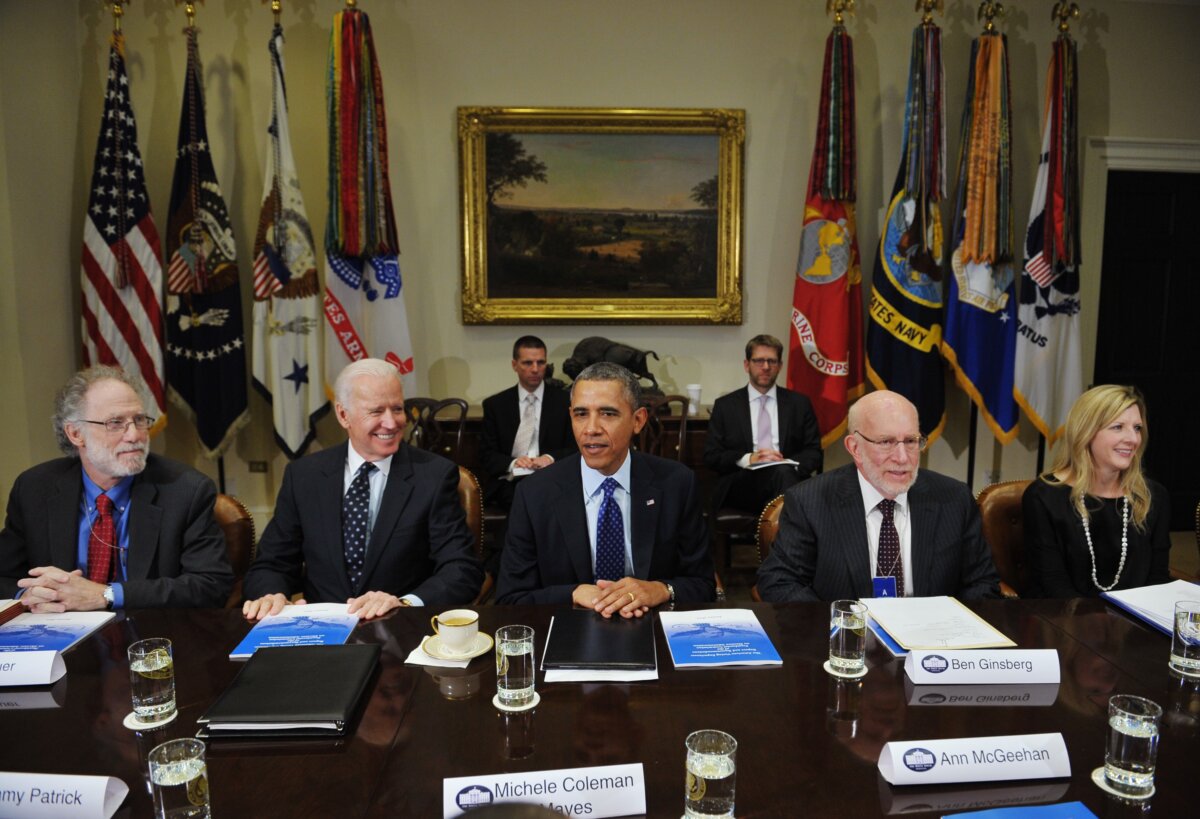 White House counsel Kathy Ruemmler (R), sits with Presidents Commission on Election Administration co-chair Robert Bauer (L), Vice President Joe Biden (2nd L), President Barack Obama (C), and Commission co-chair Benjamin Ginsberg (2nd R) in the Roosevelt Room of the White House on Jan. 22, 2014. (Mandel Ngan/AFP via Getty Images)