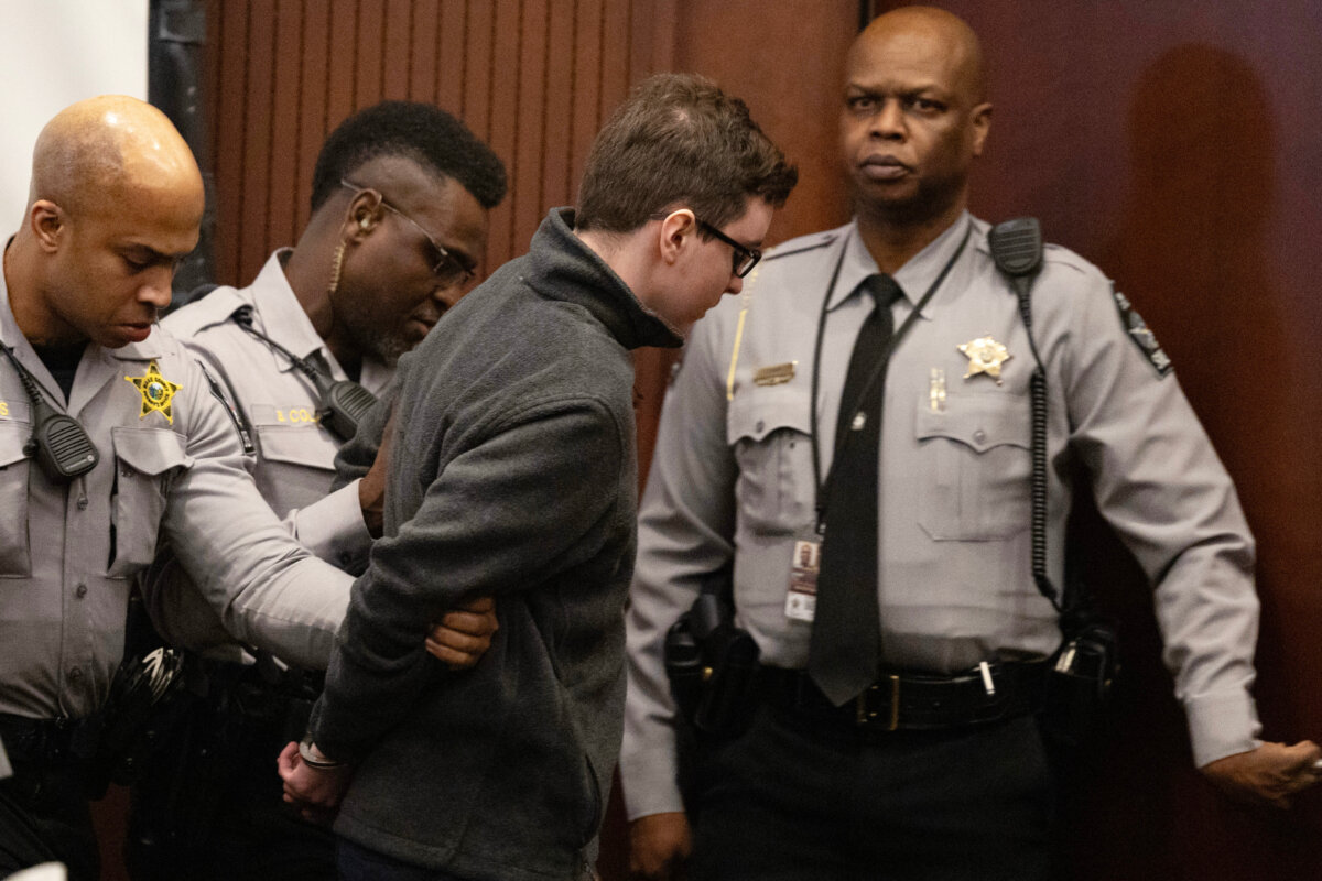 Deputies lead a handcuffed Austin Thompson from the courtroom in Raleigh, N.C., on Feb. 13, 2026, after he was sentenced to five life sentences without the possibility of parole. (Scott Sharpe/The News & Observer via AP, Pool)