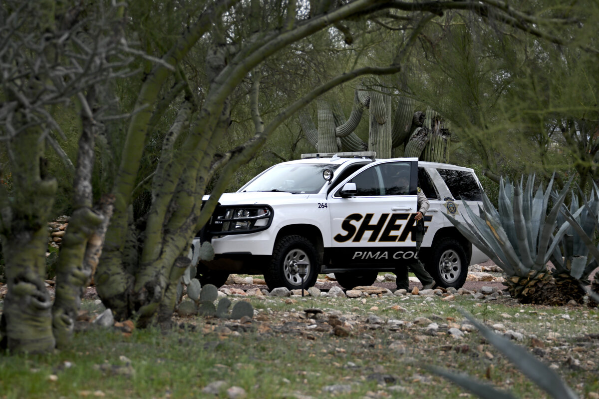 A Pima County Sheriff's deputy keeps watch outside Nancy Guthrie's residence in Tucson, Ariz., on Feb. 13, 2026. (Brandon Bell/Getty Images)