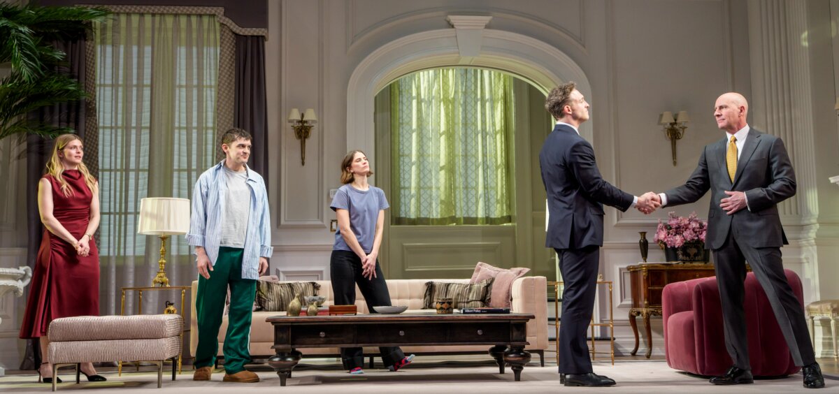 (L–R) Julia (Molly Griggs), Ned (Wesley Taylor), Linda (Bryce Gangel), Johnny Case (Luigi Sottile), and Edward (Jordan Lage), in "Holiday." (Copyright Todd Rosenberg 2026)