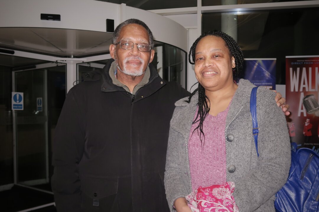 Linford Sweeney and Tiki Black attend Shen Yun Performing Arts at the Venue Cymru in Llandudno, Wales, on Feb. 14, 2026. (Jenna Zhan/The Epoch Times)