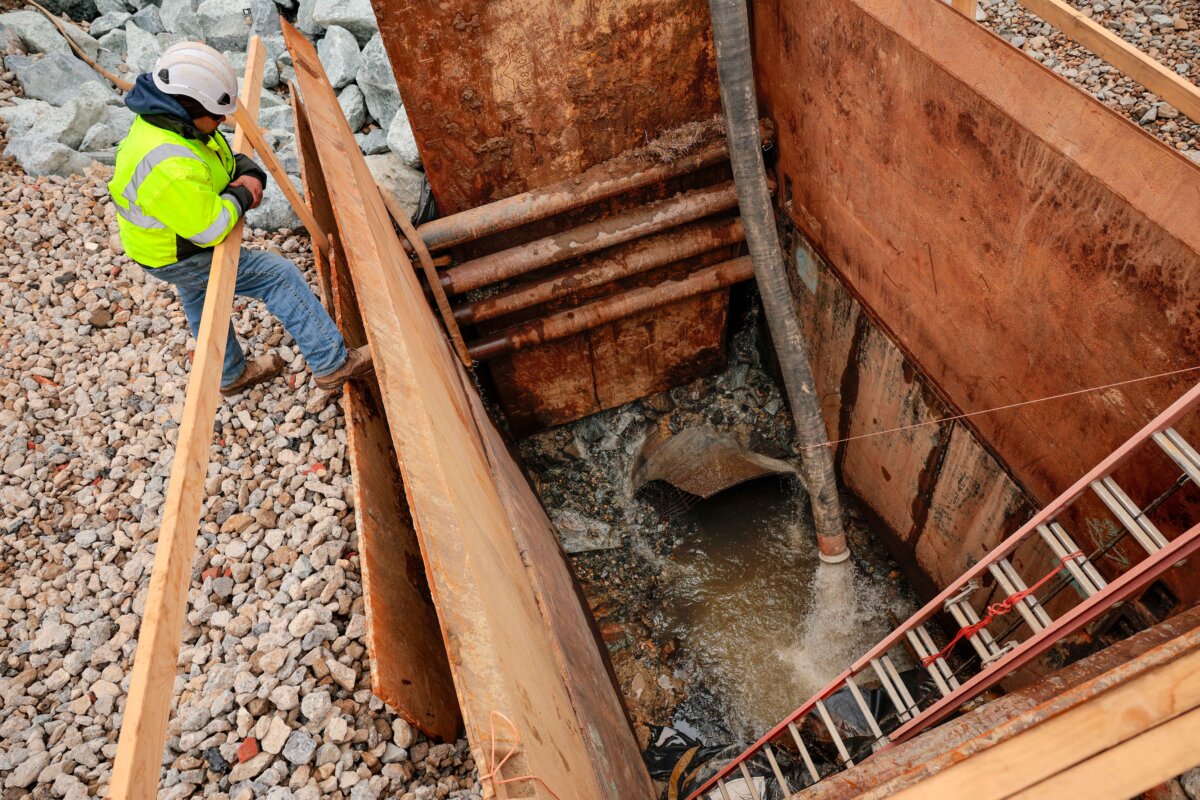 Repair work continues on the broken section of the Potomac Interceptor, a six-foot-wide sewage pipe that collapsed, releasing nearly 250 million gallons of raw sewage, on Jan. 19, in between the Clara Barton Parkway and the C&O Canal in Cabin John, Md., on Feb. 16, 2026. (Chip Somodevilla/Getty Images)