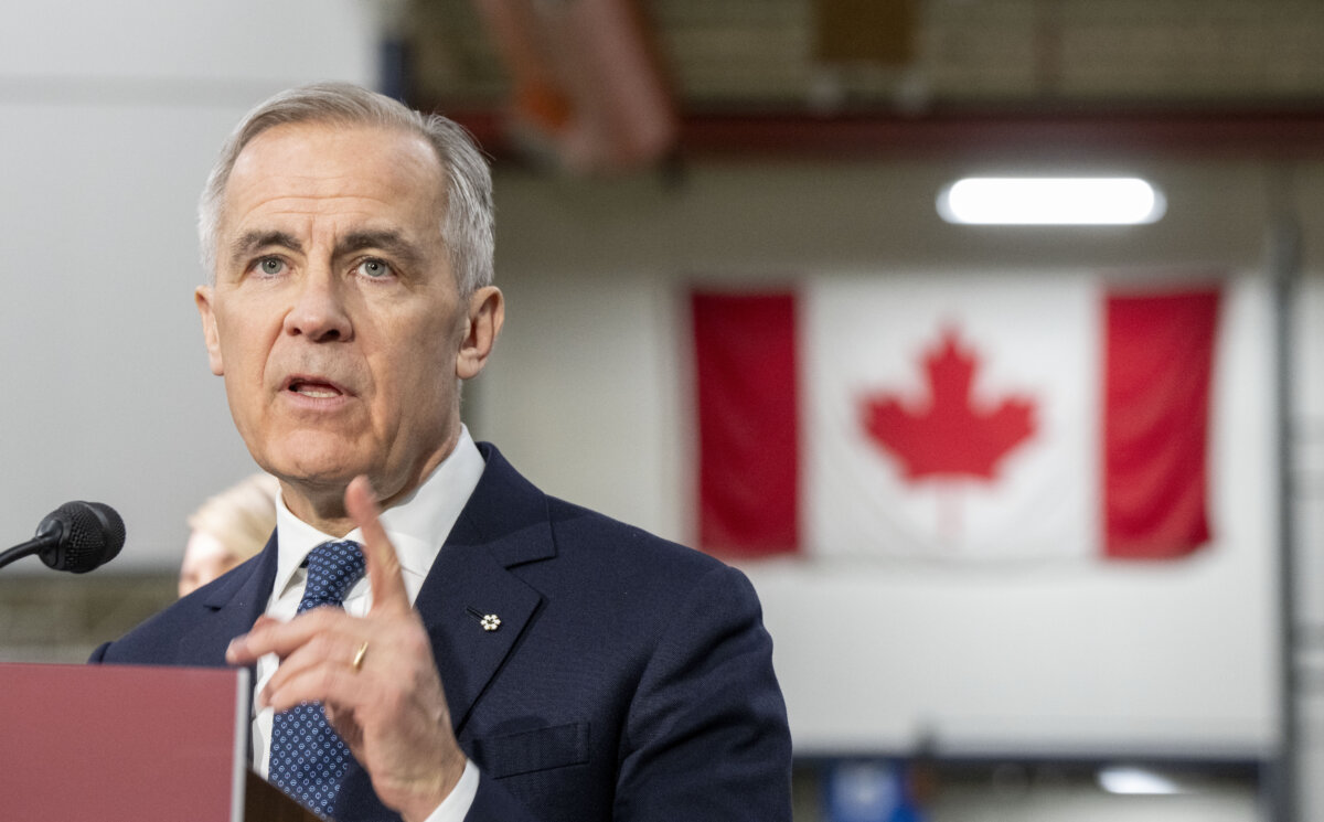 Prime Minister Mark Carney speaks at a press conference in Montreal on Feb. 17, 2026. (The Canadian Press/Christinne Muschi)
