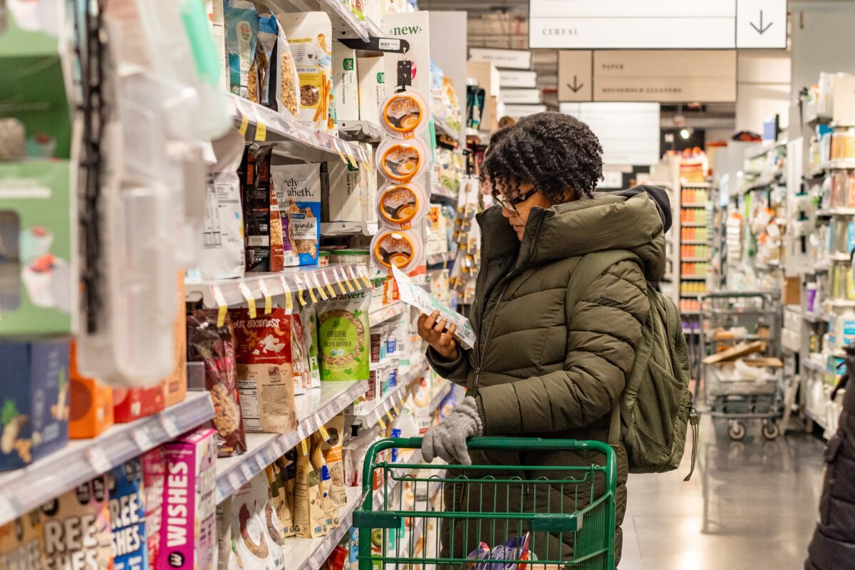 People shop at a grocery store in New York City on March 12, 2025. (Samira Bouaou/The Epoch Times)