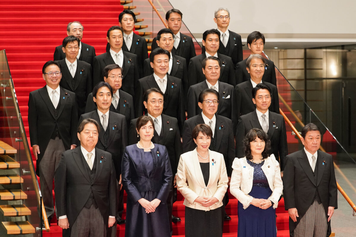 Japanese Prime Minister Sanae Takaichi with members of her cabinet at the Prime Minister's Office in Tokyo on Feb. 18, 2026. (Kazuhiro Nogi/Pool/AFP via Getty Images)