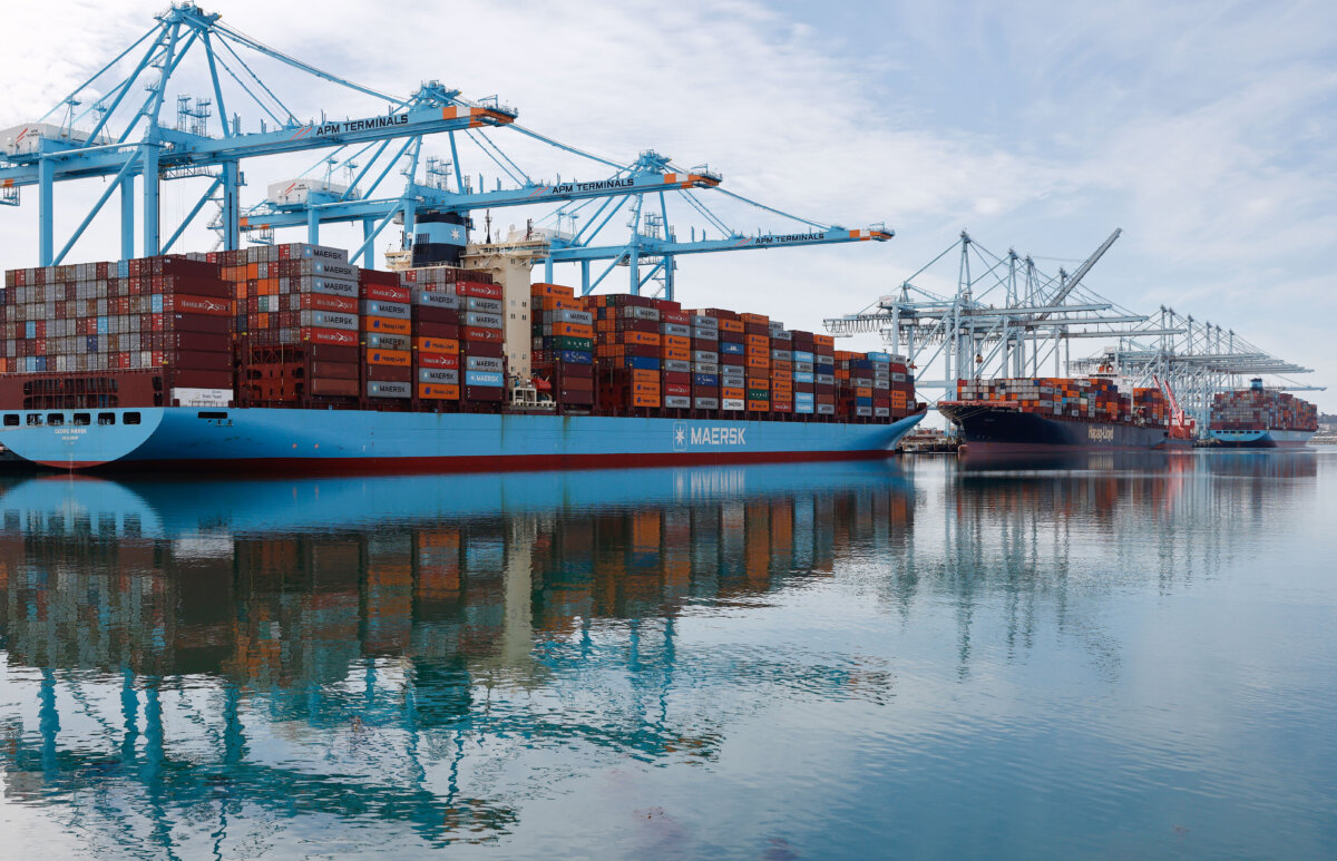 Shipping cranes stand above container ships loaded with shipping containers at the Port of Los Angeles in Los Angeles on Feb. 20, 2026. The U.S. Supreme Court has ruled that President Trump’s sweeping emergency tariffs on most U.S. trading partners were illegal. (Mario Tama/Getty Images)