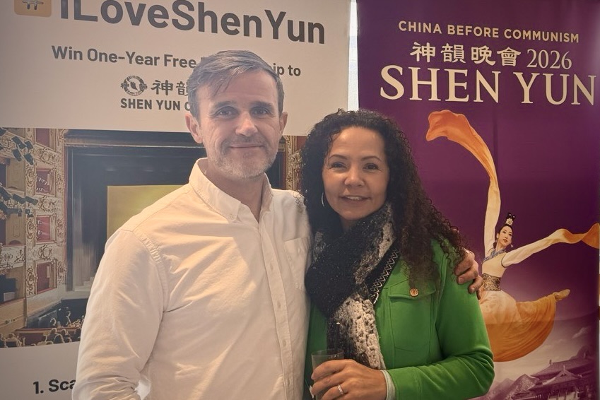 Carl O'Dell and Mia Lawrence attend Shen Yun Performing Arts at the Wycombe Swan Theatre in England on Feb. 21, 2026. (The Epoch Times)