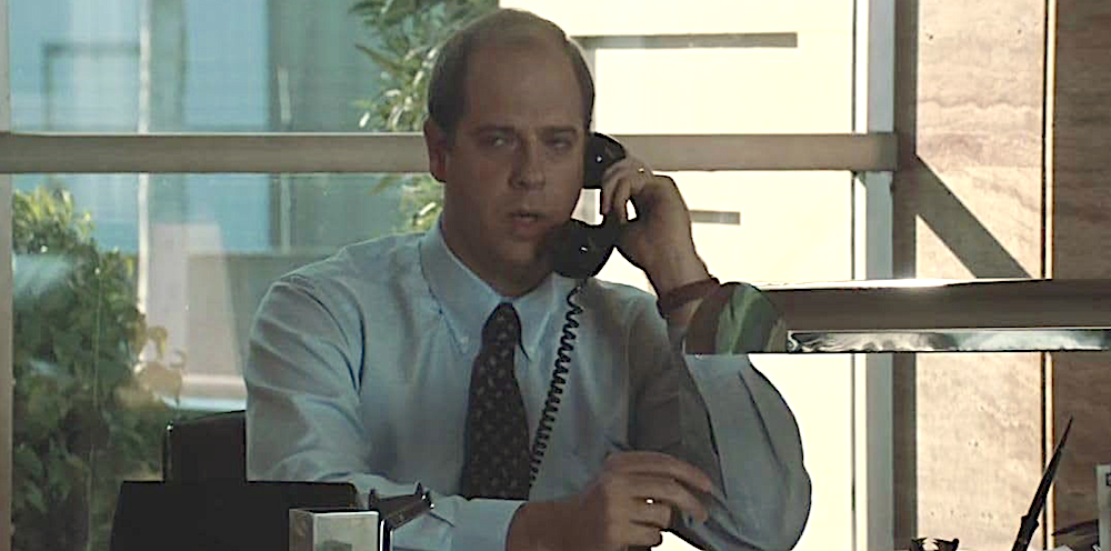 man in white shirt and tie on telephone in Thelma & Louise