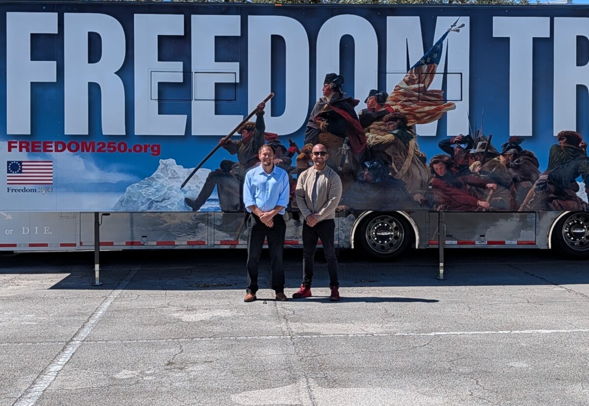 Freedom 250’s Timothy Crawford (L) and Nick Bravo brought their mobile museum Freedom Truck to Florida Atlantic University in Boca Raton on Feb. 23, 2026. (Jacob Burg/The Epoch Times)