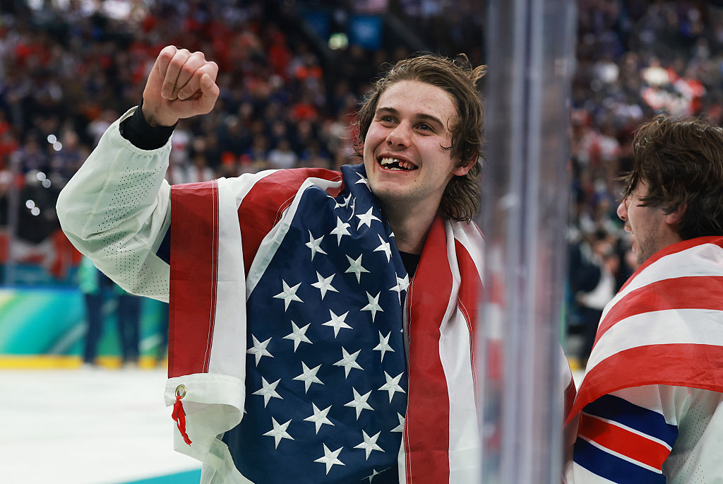 Jack Hughes of Team United States celebrates after the team's gold medal win during the match between Canada and the United States on day 16 of the Milano Cortina 2026 Winter Olympic Games at Milano Santagiulia Ice Hockey Arena in Milan, on Feb. 22, 2026. (Elsa/Getty Images)