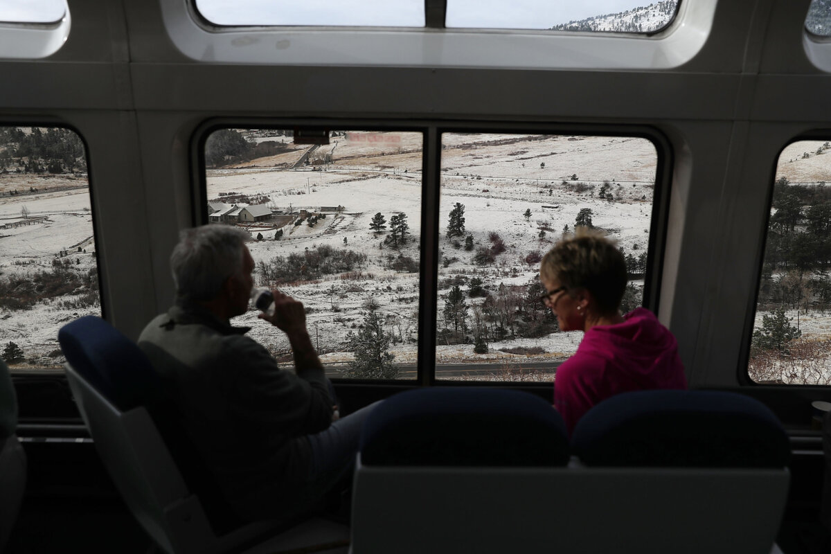 Passengers enjoy the sightseer lounge car on Amtrak's California Zephyr during its daily 2,438-mile trip to Emeryville/San Francisco from Chicago on March 24, 2017, in Denver, Colorado. (Joe Raedle/Getty Images/TNS)