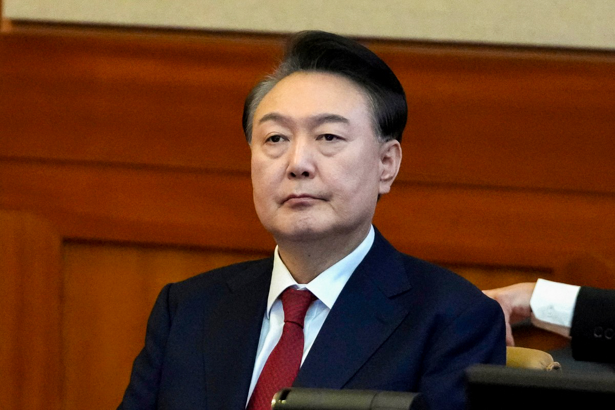 South Korea's impeached President Yoon Suk Yeol attends a hearing of his impeachment trial at the Constitutional Court in Seoul, South Korea, on Feb. 11, 2025. (Lee Jin-man/Pool/AP Photo)