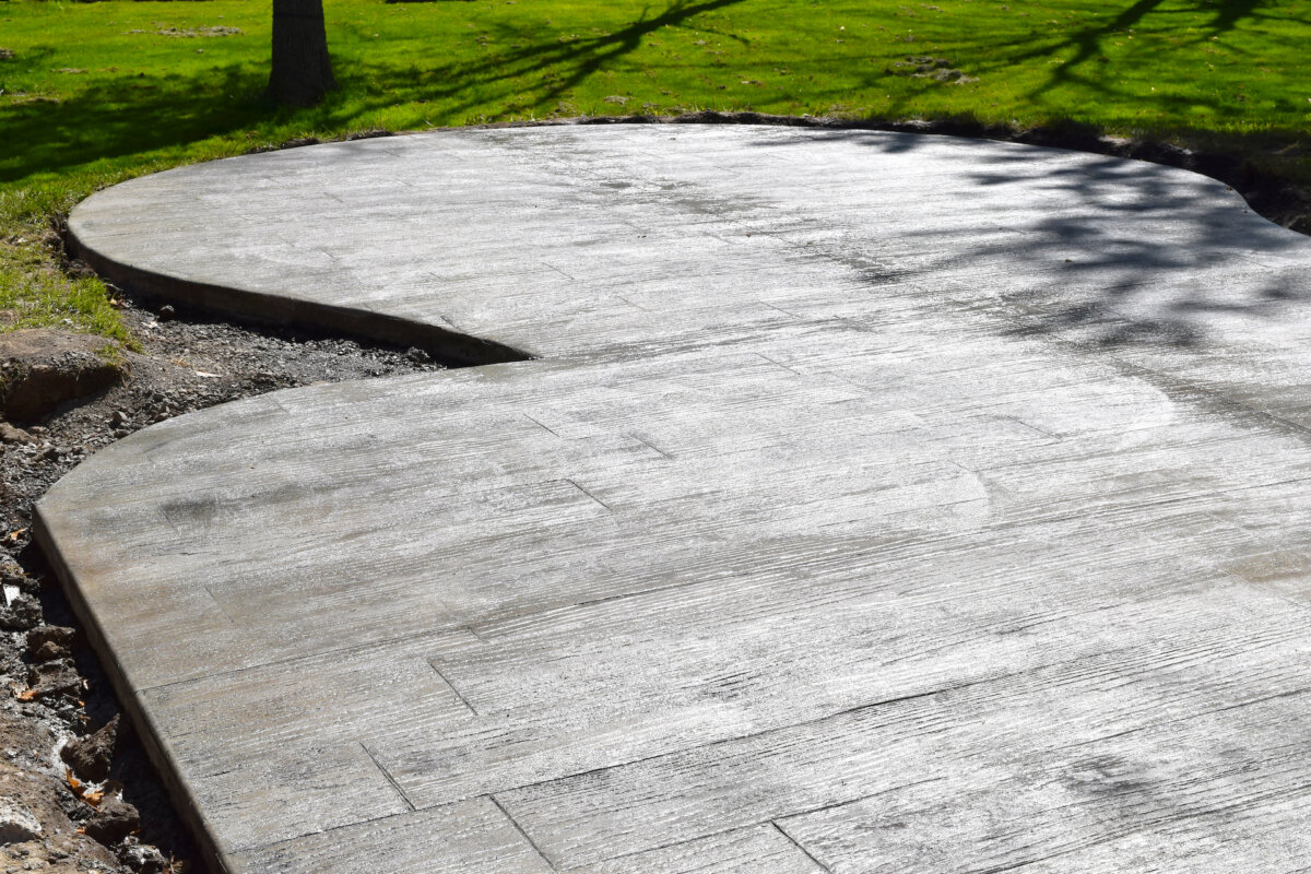There are many different strengths of concrete that you can specify for the patio. (eyerazor/Shutterstock)