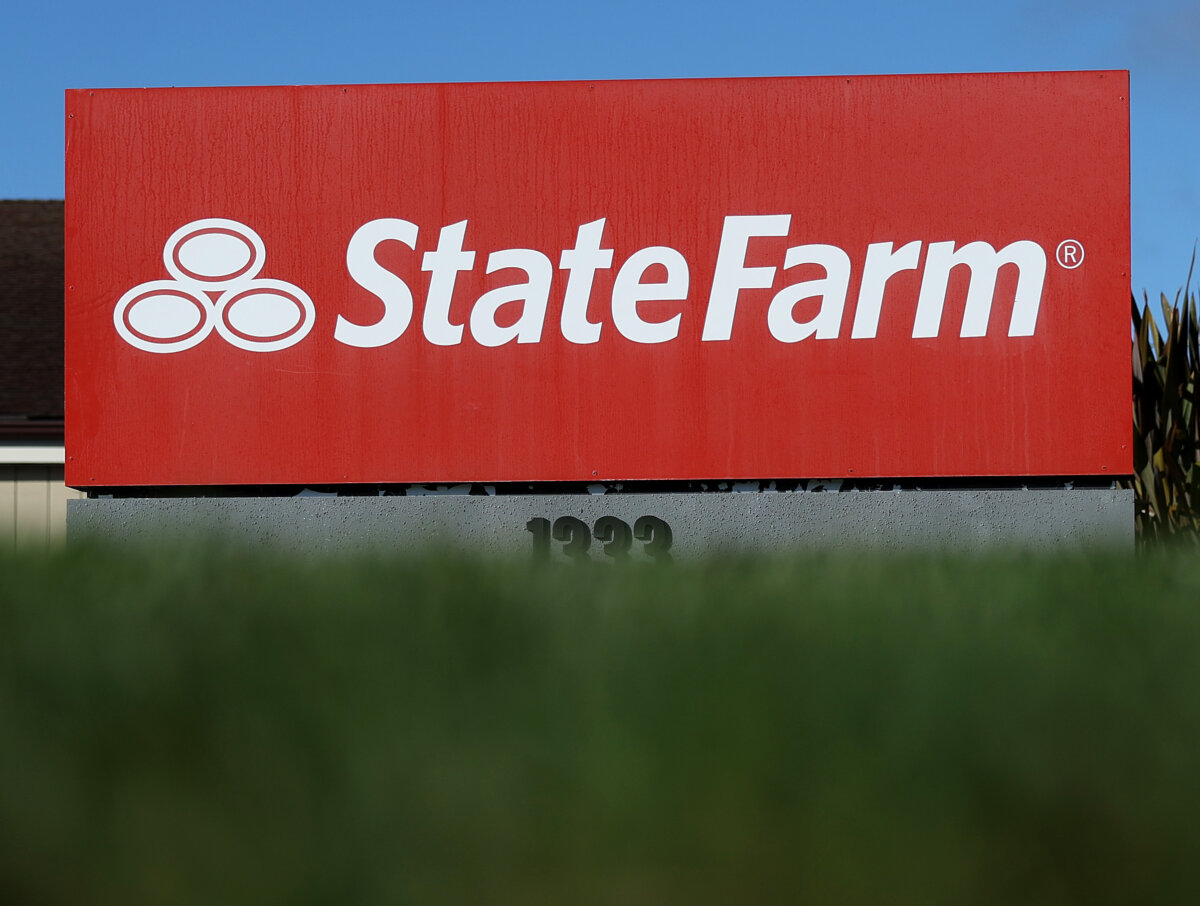 A sign is posted in front of a State Farm office in Pinole, Calif., on Jan. 3, 2024. (Justin Sullivan/Getty Images)