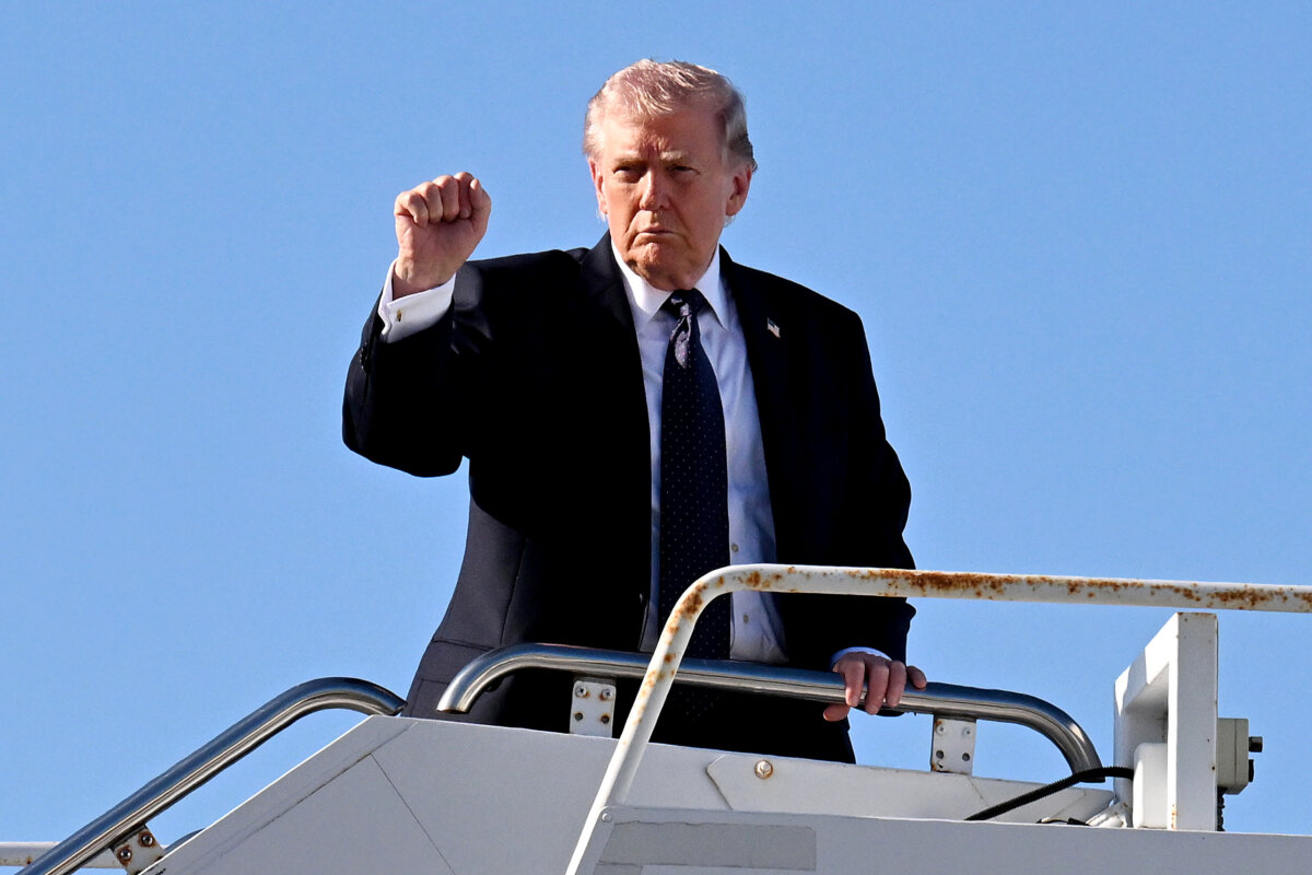 President Donald Trump boards Air Force One in Palm Beach, Fla., on March 1, 2026. (Roberto Schmidt/Getty Images)