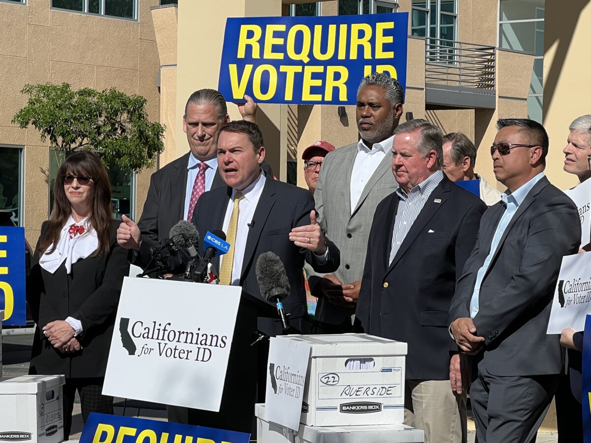 California state Assemblyman Carl DeMaio along with Tafa Jefferson of Californians for Voter ID (R), Congressman Ken Calvert (far R), and state Sen. Tony Strickland (L) support a statewide voter ID ballot initiative at the Riverside County Registrar of Voters office in Riverside, Calif. (Brad Jones/The Epoch Times)