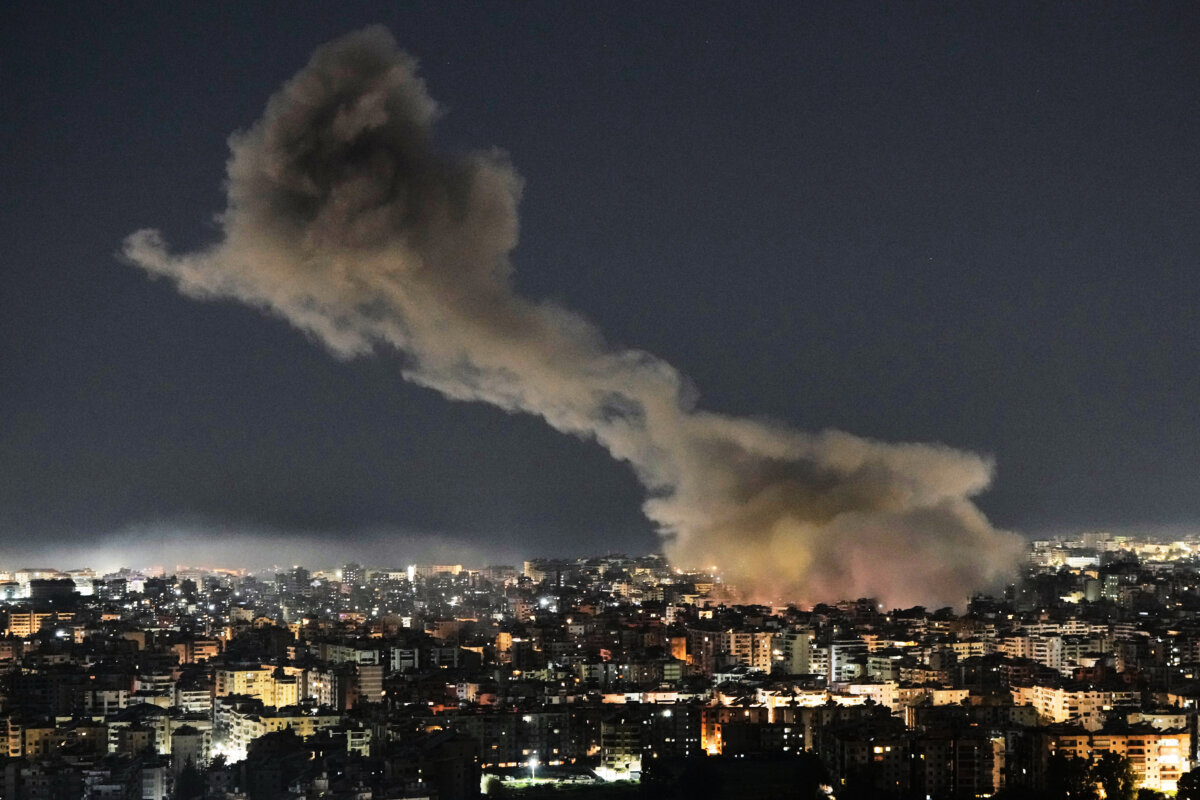 Smoke rises from Israeli airstrikes that struck a building housing Al-Manar channel studios in Dahiyeh, a southern suburb of Beirut, Lebanon, on March 3, 2026. (Bilal Hussein/AP)